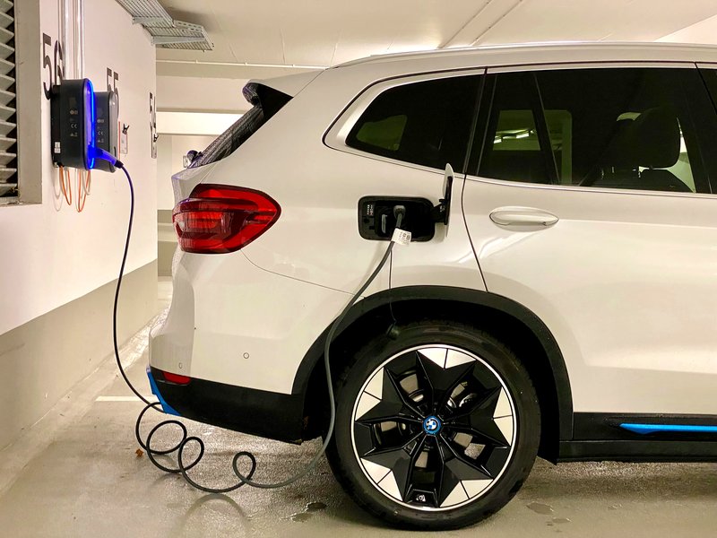 EV charger installed in home garage — Nick Cope Electrical, Hills District